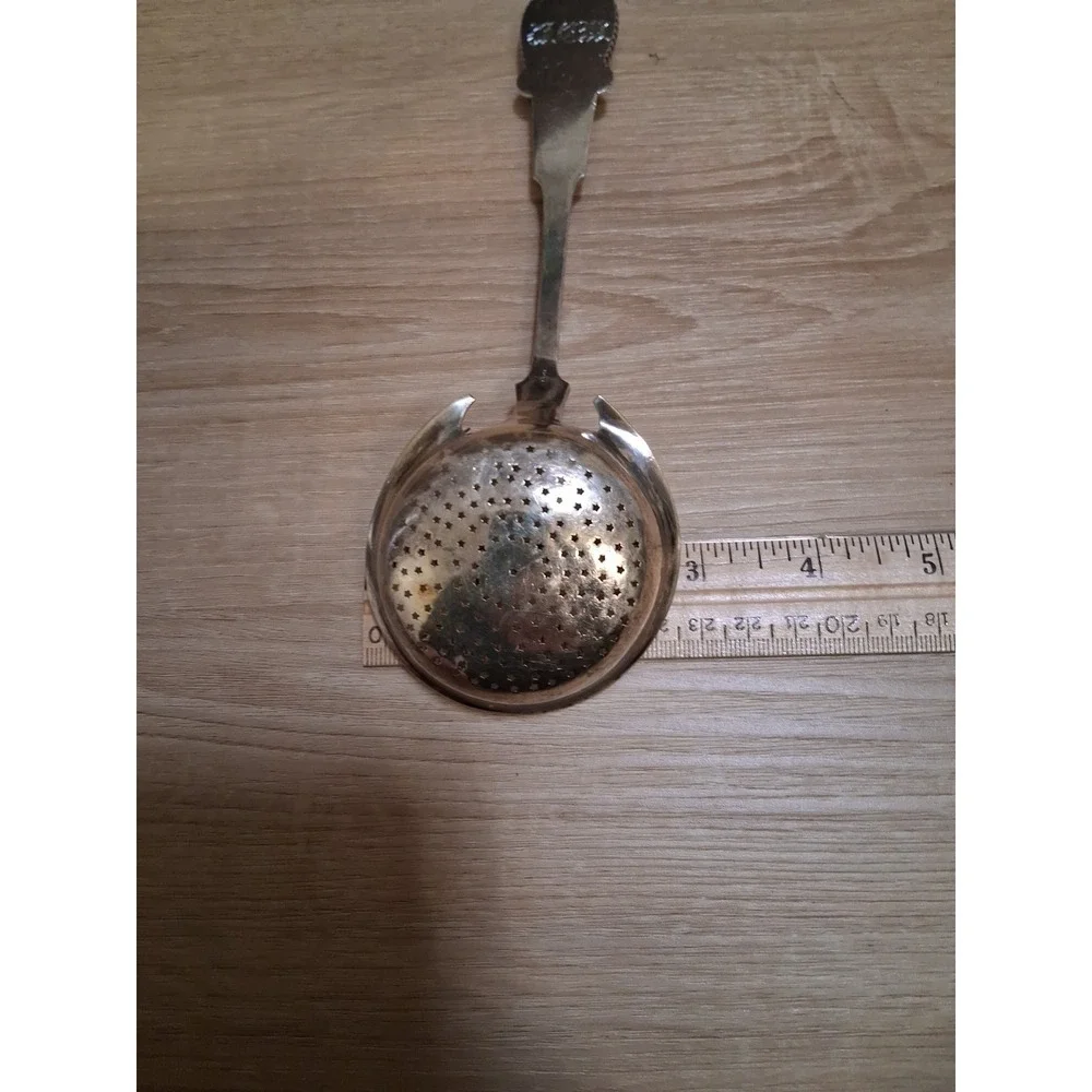 WOOD & HUGHES pierced Serving Ladle / Sifter MEDALLION 3D face. Rare 1870s